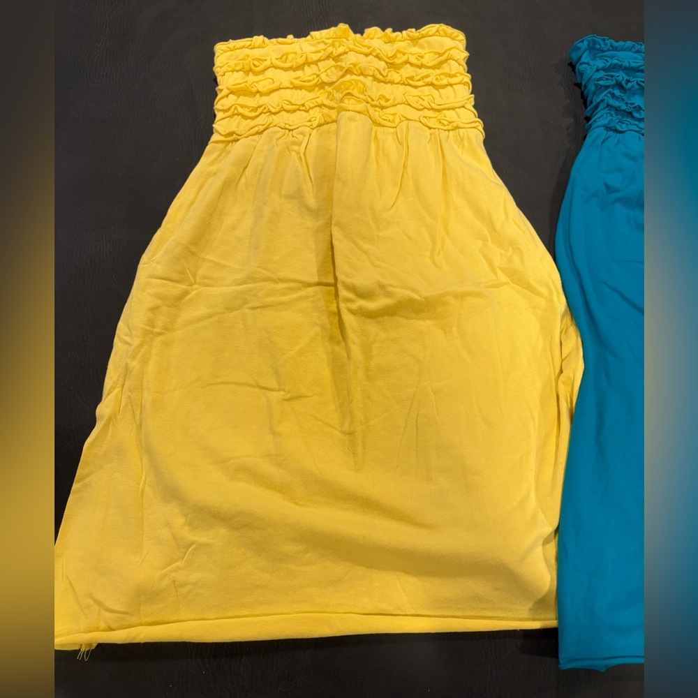 Yellow and teal cover ups